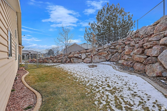 view of yard covered in snow