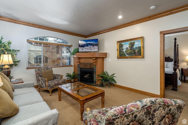 carpeted living room featuring a tile fireplace and crown molding