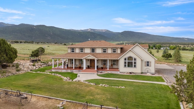 650 E 600 S, Spring City, UT 84662 - view of front of property with covered porch, a mountain view, driveway, and a front lawn