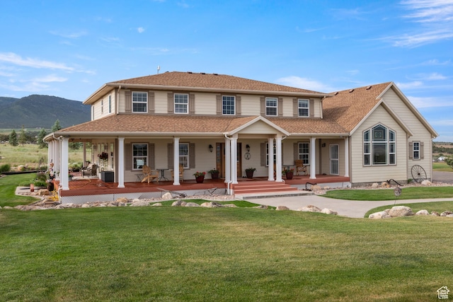 650 E 600 S, Spring City, UT 84662 - view of front of house with covered porch, a front lawn, a mountain view, and a shingled roof