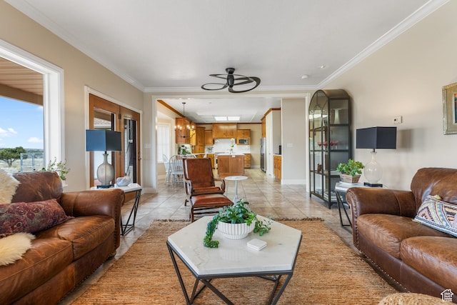 650 E 600 S, Spring City, UT 84662 - tiled living room with ceiling fan with notable chandelier, a wealth of natural light, and ornamental molding