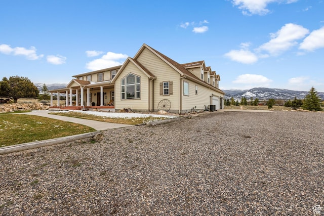 650 E 600 S, Spring City, UT 84662 - exterior space with central AC, a mountain view, a porch, and a garage