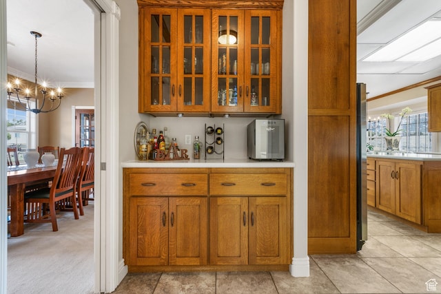 650 E 600 S, Spring City, UT 84662 - bar featuring light carpet, a chandelier, decorative light fixtures, and ornamental molding