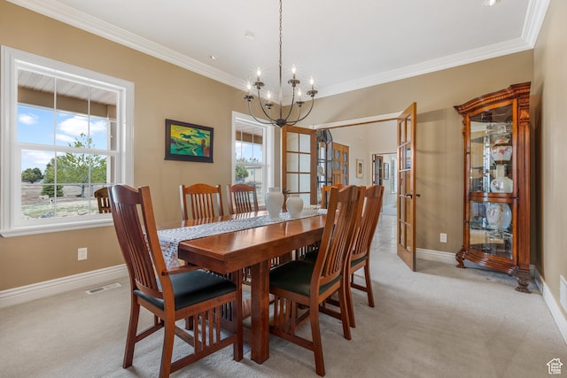 650 E 600 S, Spring City, UT 84662 - carpeted dining space featuring a healthy amount of sunlight, crown molding, and an inviting chandelier