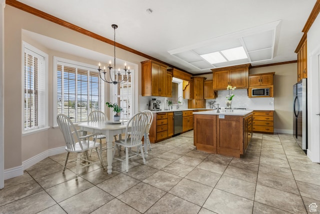 650 E 600 S, Spring City, UT 84662 - kitchen featuring stainless steel appliances, crown molding, decorative light fixtures, an inviting chandelier, and a kitchen island