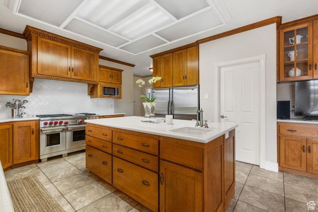 650 E 600 S, Spring City, UT 84662 - kitchen with sink, a kitchen island with sink, decorative backsplash, light tile patterned floors, and appliances with stainless steel finishes