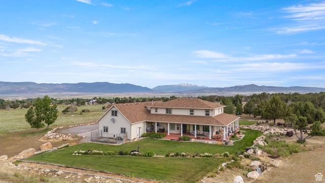 650 E 600 S, Spring City, UT 84662 - view of front of property featuring covered porch, a mountain view, a front lawn, and dirt driveway
