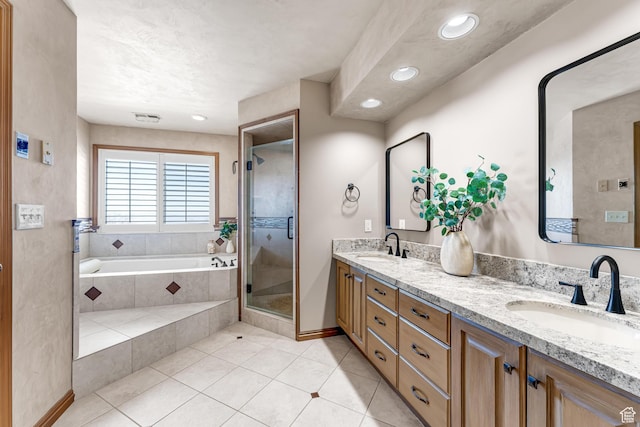 3893 S Bountiful Blvd, Bountiful, UT 84010 - full bathroom featuring double vanity, a sink, a garden tub, and a stall shower
