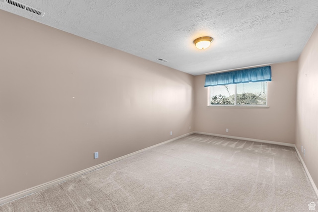 3893 S Bountiful Blvd, Bountiful, UT 84010 - carpeted spare room with a textured ceiling, baseboards, and visible vents