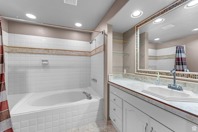 3893 S Bountiful Blvd, Bountiful, UT 84010 - full bath featuring vanity, tiled shower / bath, recessed lighting, and visible vents