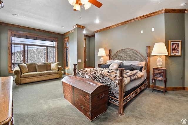 bedroom with carpet flooring, ceiling fan, crown molding, and baseboard heating