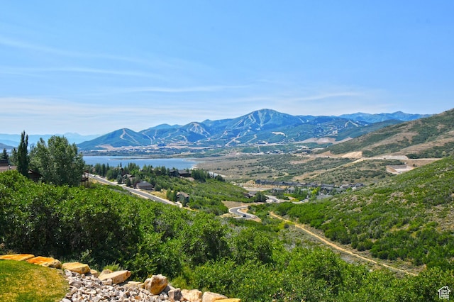 view of mountain feature featuring a water view