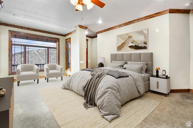 carpeted bedroom with ceiling fan and crown molding