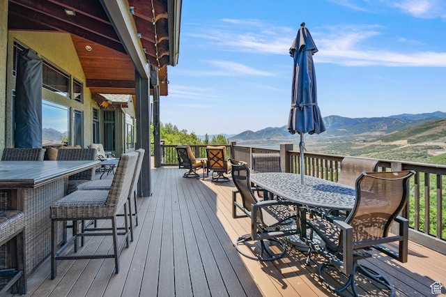 wooden terrace with a mountain view