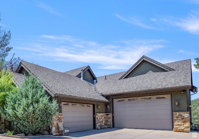 view of front of property with a garage