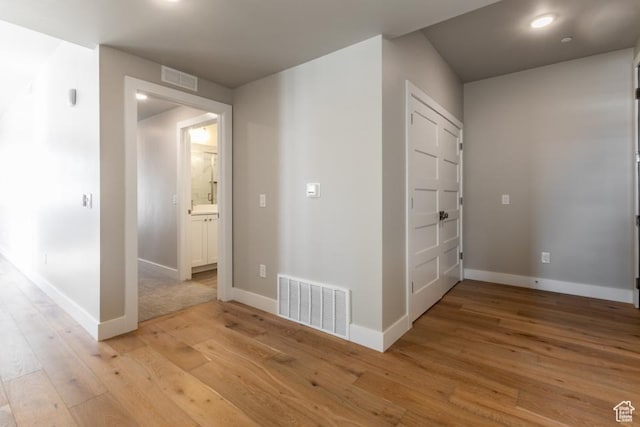 1166 W Helling Cir Unit 203, Heber City, UT 84032 - corridor with light hardwood / wood-style floors