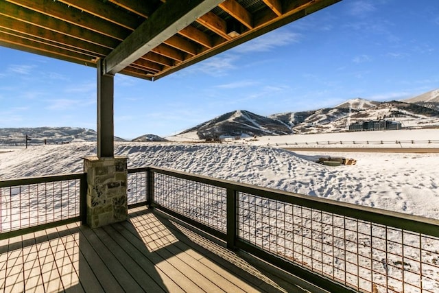 1166 W Helling Cir Unit 203, Heber City, UT 84032 - snow covered deck featuring a mountain view
