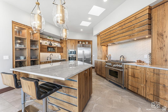 2523 N Chaco Trl, St George, UT 84770 - kitchen with built in appliances, open shelves, a skylight, a sink, and backsplash