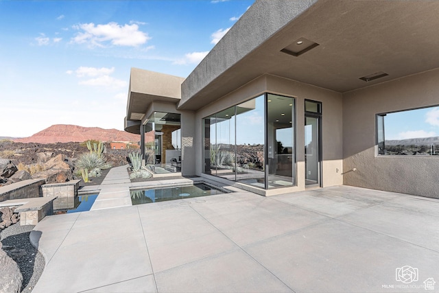 2523 N Chaco Trl, St George, UT 84770 - view of patio / terrace featuring a mountain view