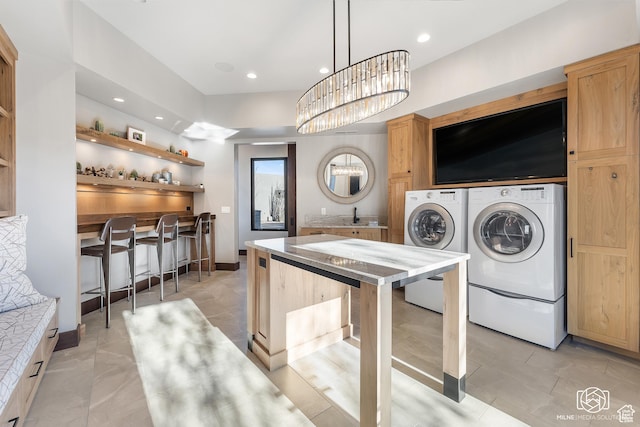 2523 N Chaco Trl, St George, UT 84770 - washroom with independent washer and dryer, recessed lighting, and a chandelier
