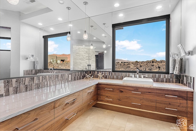 2523 N Chaco Trl, St George, UT 84770 - bathroom with double vanity, recessed lighting, plenty of natural light, and backsplash