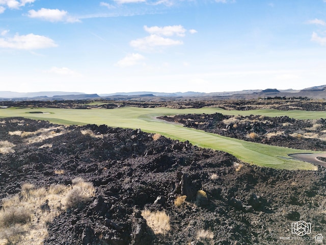 2523 N Chaco Trl, St George, UT 84770 - aerial view of property and surrounding area with a mountainous background and a local golf course