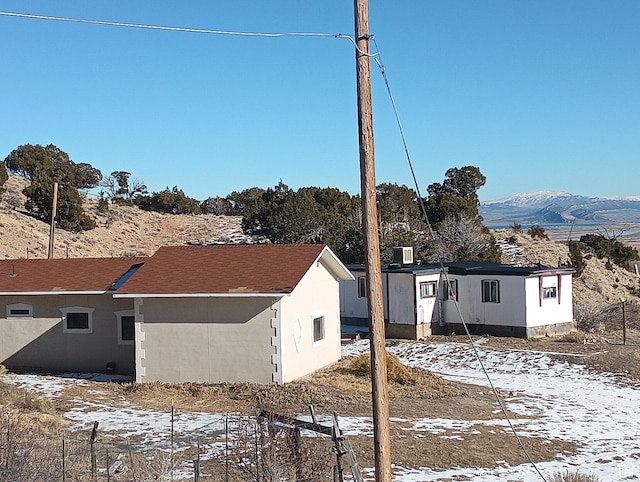 80 S Chipper Ln, Manila, UT 84046 - snow covered back of property with a mountain view