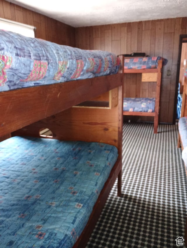 80 S Chipper Ln, Manila, UT 84046 - bedroom with a textured ceiling and wooden walls