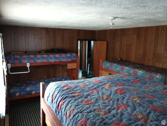 80 S Chipper Ln, Manila, UT 84046 - bedroom featuring wooden walls and a textured ceiling