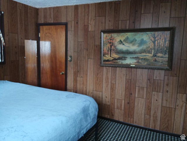 80 S Chipper Ln, Manila, UT 84046 - bedroom featuring a textured ceiling and wood walls