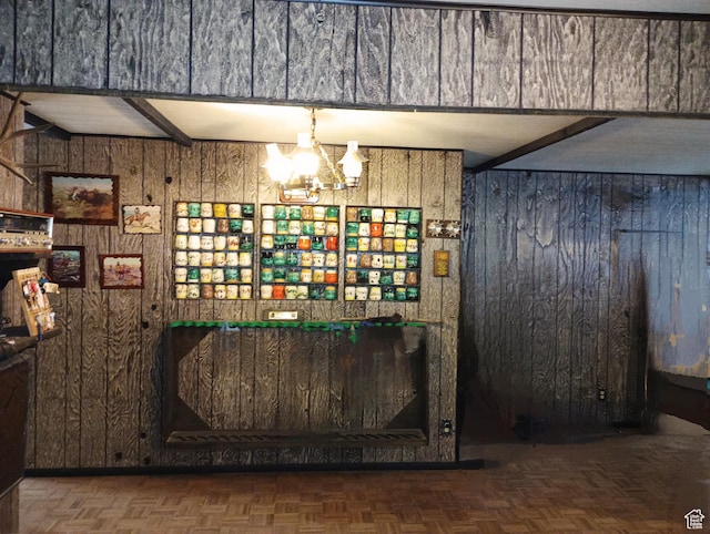 80 S Chipper Ln, Manila, UT 84046 - bar featuring parquet floors, an inviting chandelier, and wood walls