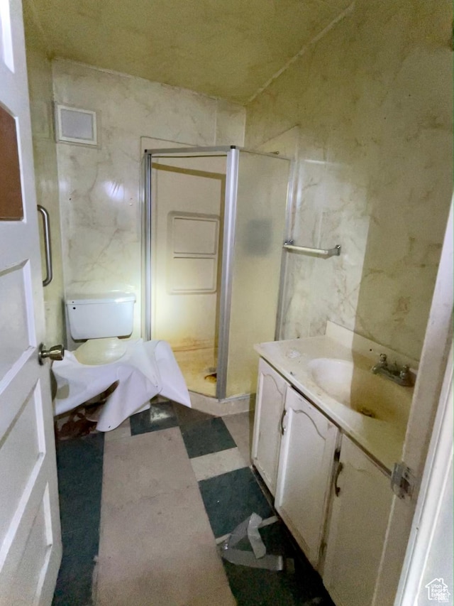 bathroom with vanity and walk in shower