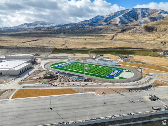birds eye view of property with a mountain view