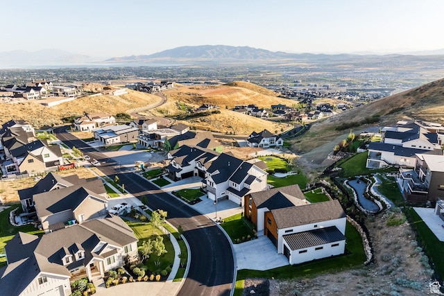 drone / aerial view featuring a mountain view