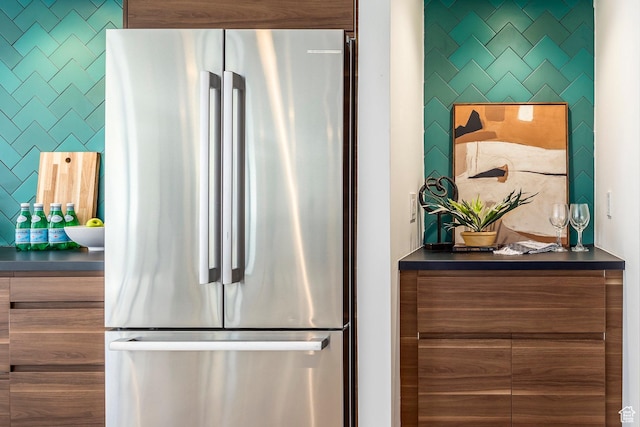 kitchen featuring stainless steel refrigerator