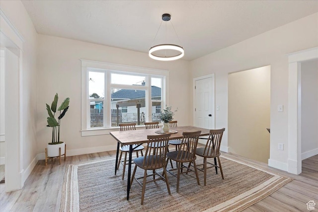 dining room with light wood-type flooring