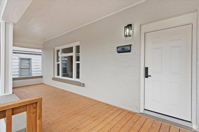 doorway to property with a porch