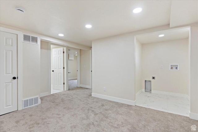 interior space featuring light colored carpet