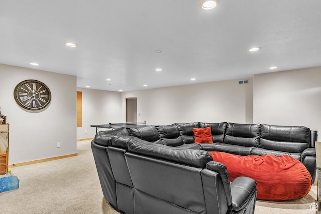 living room featuring light carpet