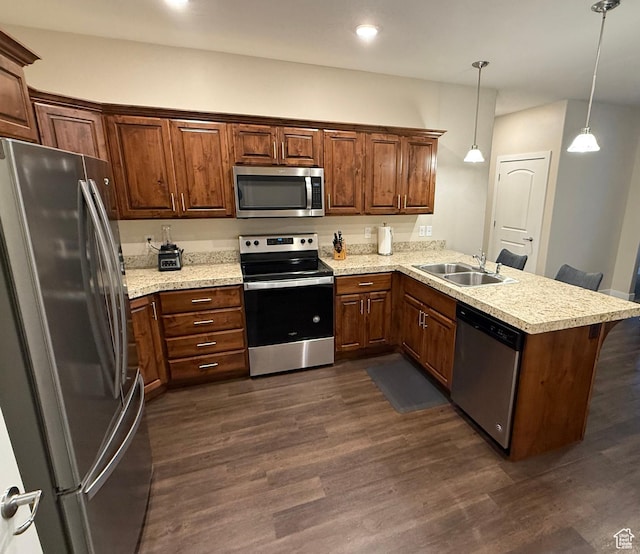 1768 W 300 S Unit D, Mapleton, UT 84664 - kitchen with sink, kitchen peninsula, hanging light fixtures, dark hardwood / wood-style floors, and appliances with stainless steel finishes