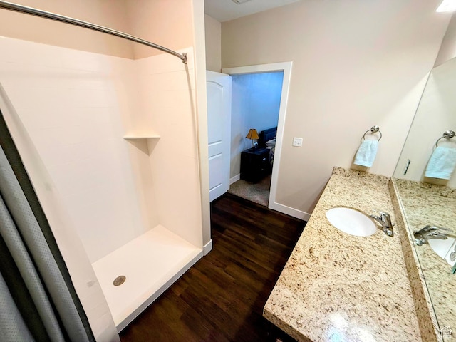 1768 W 300 S Unit D, Mapleton, UT 84664 - bathroom with hardwood / wood-style flooring, walk in shower, and vanity