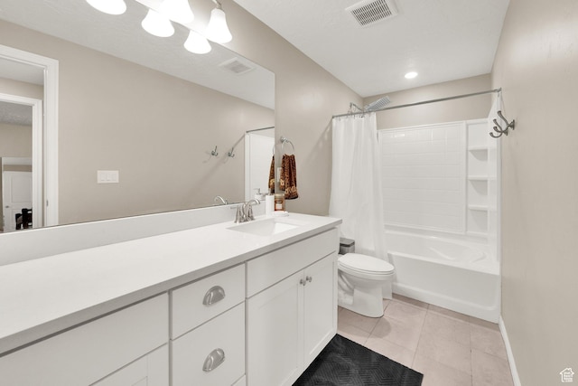 full bathroom featuring tile patterned flooring, toilet, shower / bath combo, and vanity