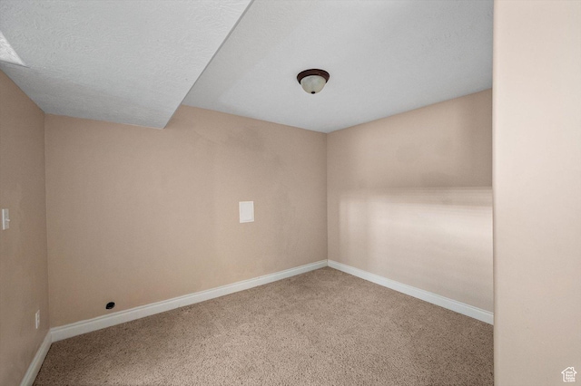4876 S 1525 E, Ogden, UT 84403 - unfurnished room featuring a textured ceiling, baseboards, and carpet floors