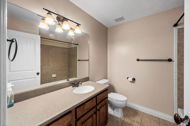 4876 S 1525 E, Ogden, UT 84403 - full bathroom featuring tile patterned floors, visible vents, toilet, walk in shower, and vanity