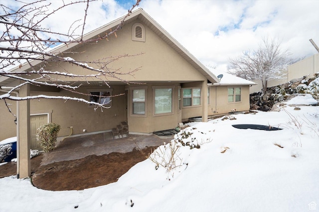 4876 S 1525 E, Ogden, UT 84403 - snow covered property featuring stucco siding