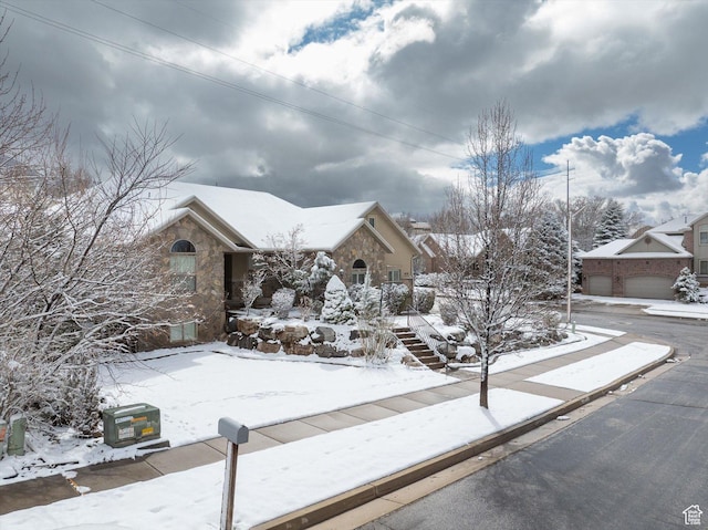 4876 S 1525 E, Ogden, UT 84403 - view of snow covered exterior featuring stone siding