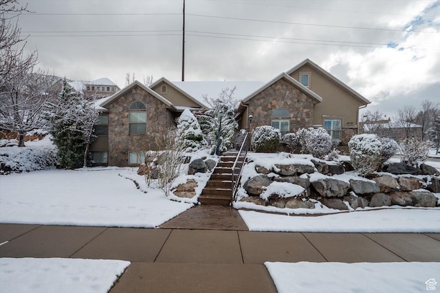 4876 S 1525 E, Ogden, UT 84403 - view of front of property featuring stone siding, stucco siding, and stairs
