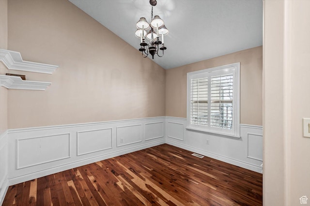 4876 S 1525 E, Ogden, UT 84403 - empty room featuring visible vents, a notable chandelier, dark wood-style floors, and vaulted ceiling