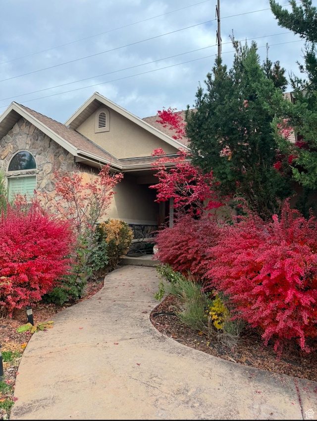 4876 S 1525 E, Ogden, UT 84403 - view of front of house featuring stucco siding and stone siding