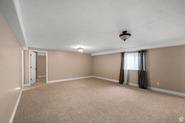 4876 S 1525 E, Ogden, UT 84403 - empty room with light colored carpet, baseboards, and a textured ceiling